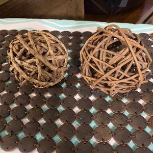2 decorative brown wooden balls 4” and 5”